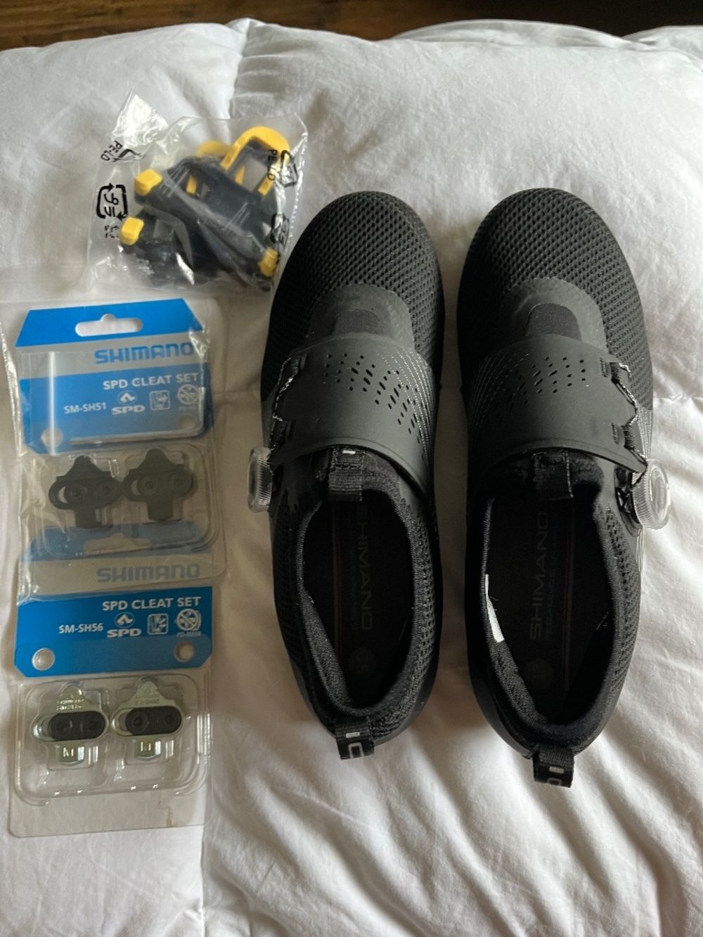 Woman’s Shimano black spin shoes size 6.5 and 3 pairs of cleat sets Brand New